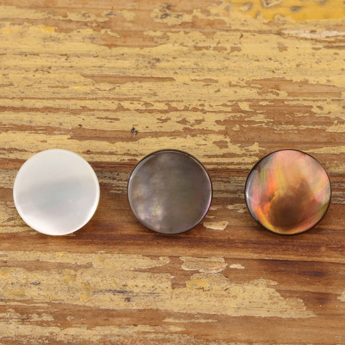 Flat shell sewing buttons, 3 finishes: matte white, smoky gray, and warm rainbow iridescent