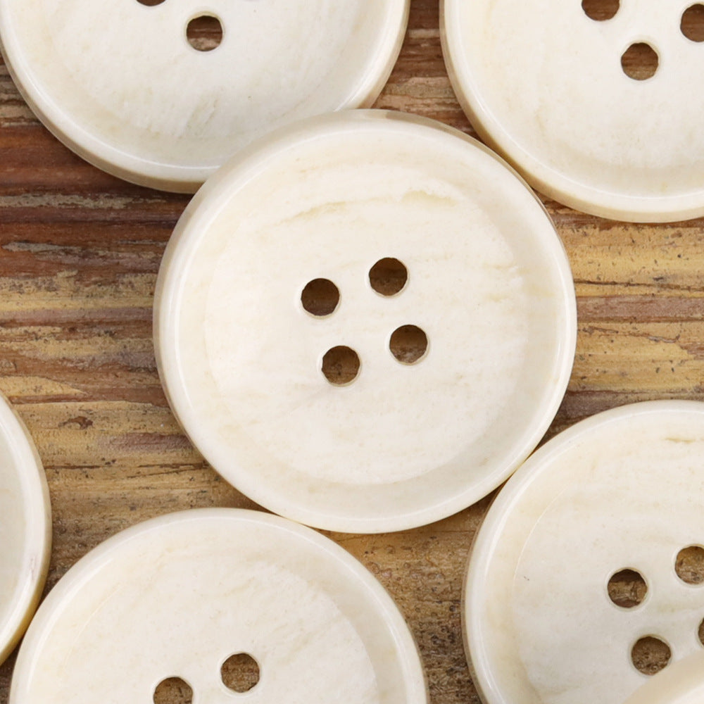 Fruit-texture urea button faces, 4-hole, cream/ivory tones