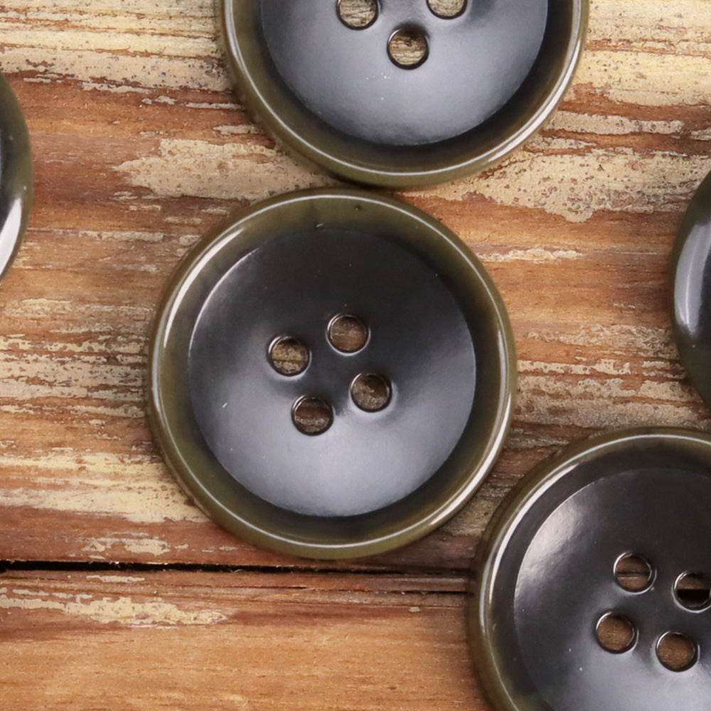 Fruit-texture urea button, 4-hole, dark olive-gray tone
