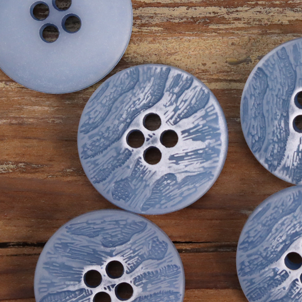 Blue wood-grain urea button, round, 4-hole with white speckled grain