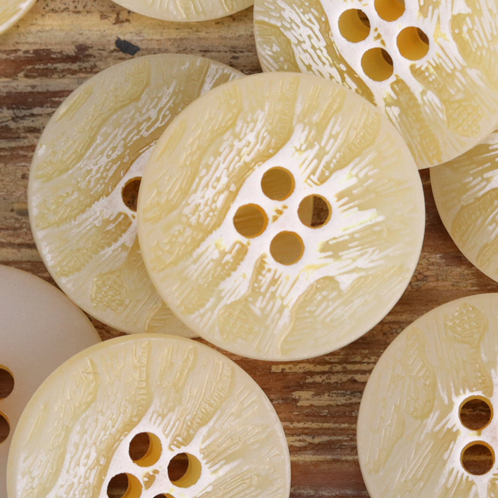Beige-yellow wood-grain urea buttons, round, 4-hole with dark button holes
