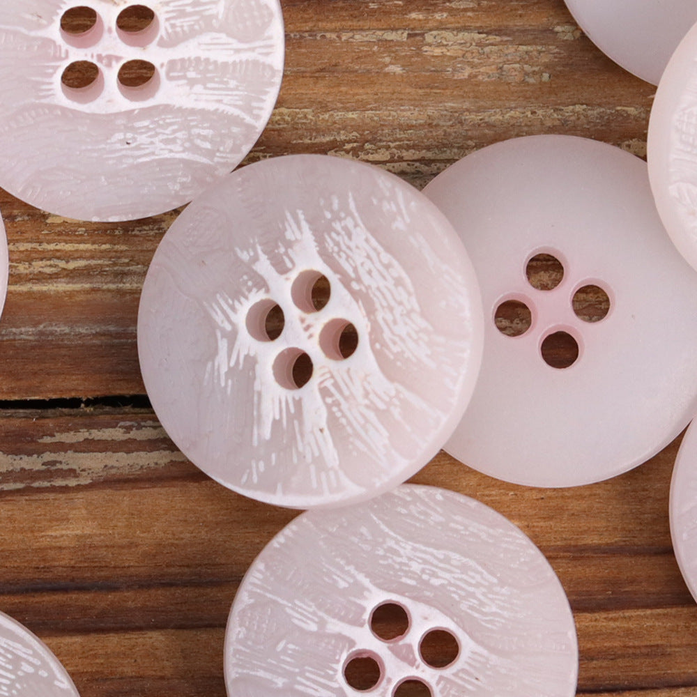 Pale pink and white round wood-grain urea buttons, 4-hole, glossy finish