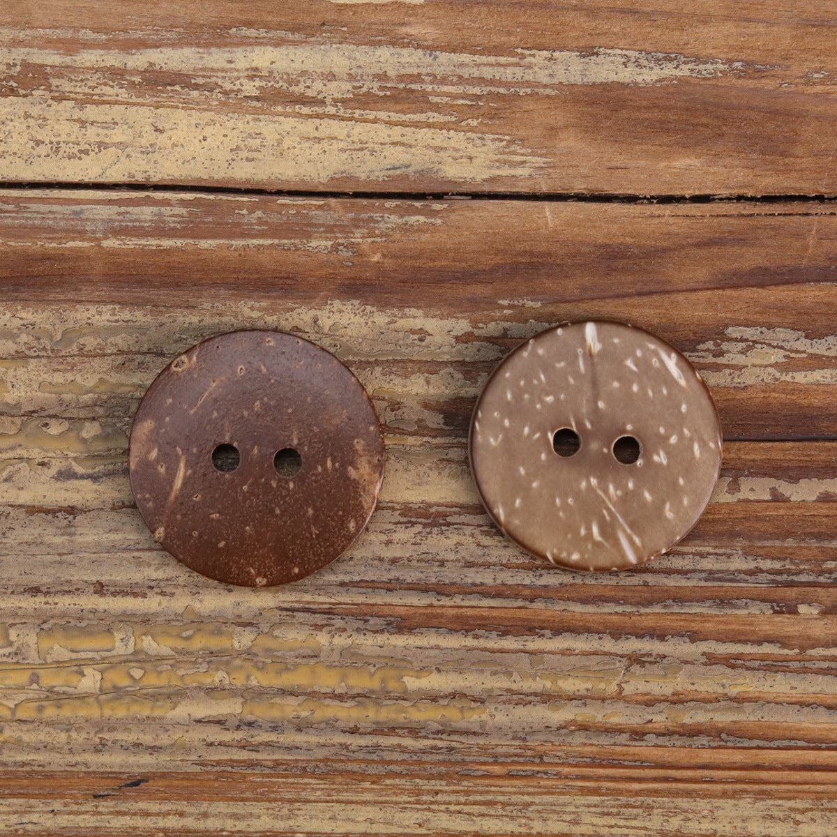Natural coconut shell fish-eye buttons, speckled light and dark brown, two-hole fronts