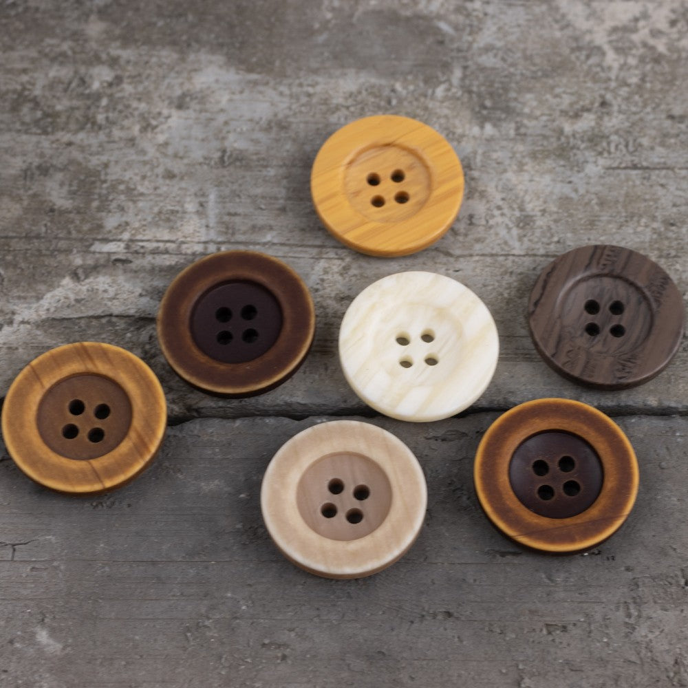 Mixed round four-hole imitation wood-grain resin buttons; yellow button on top