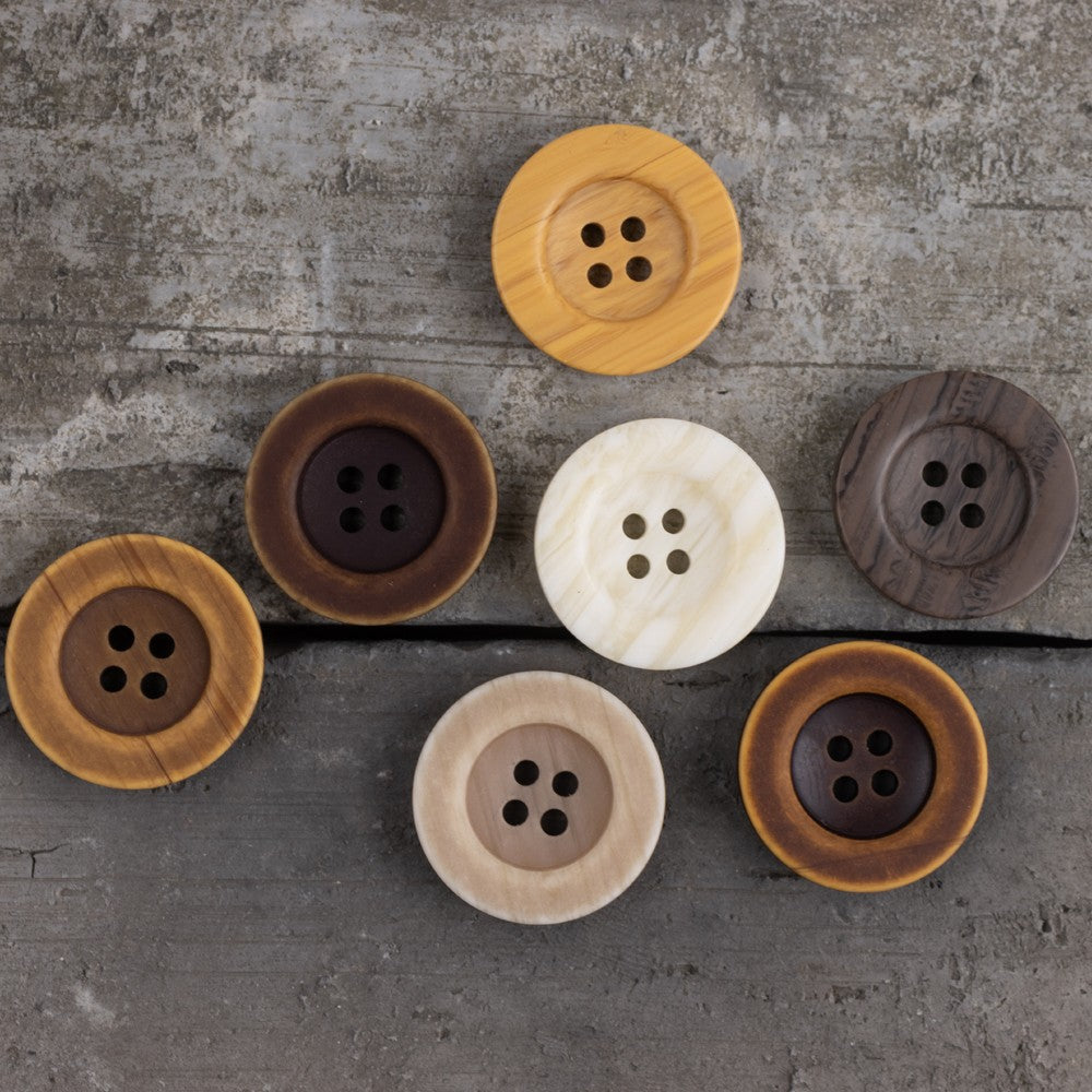 Round four-hole resin buttons with wood-grain look, including yellow and dark