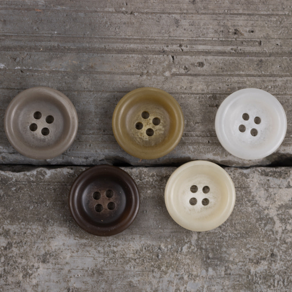 Round matte resin buttons with 4 holes in grey, olive, white, dark brown, and cream