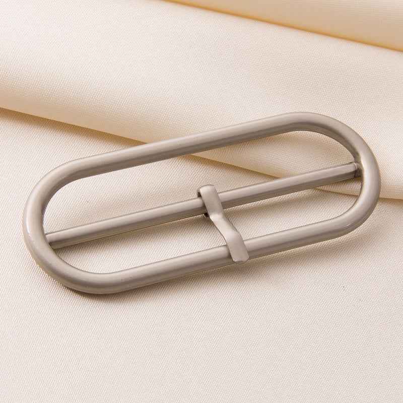 Oval center bar belt buckle clasp, rounded frame with adjustable bar, metal