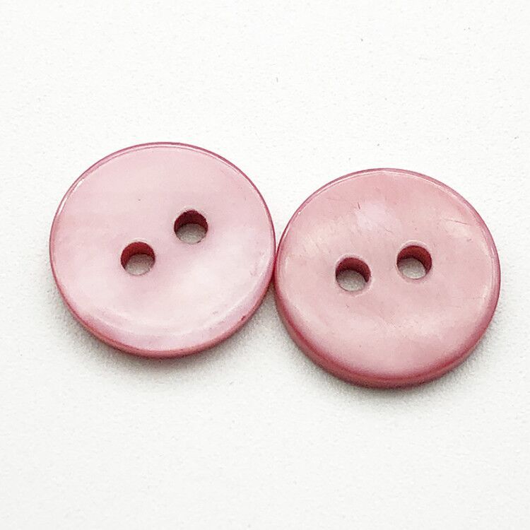 Light pink round two-hole flat shirt buttons, 12.5mm, close-up (20 pcs)