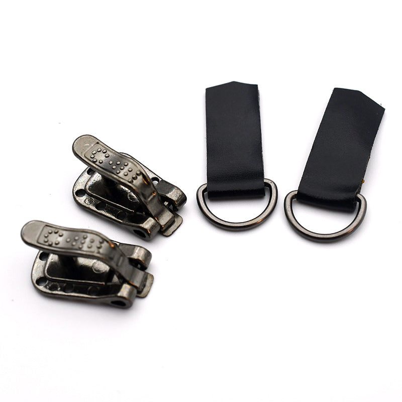 Black leather-tab invisible snap fasteners with metal backing, set of pieces