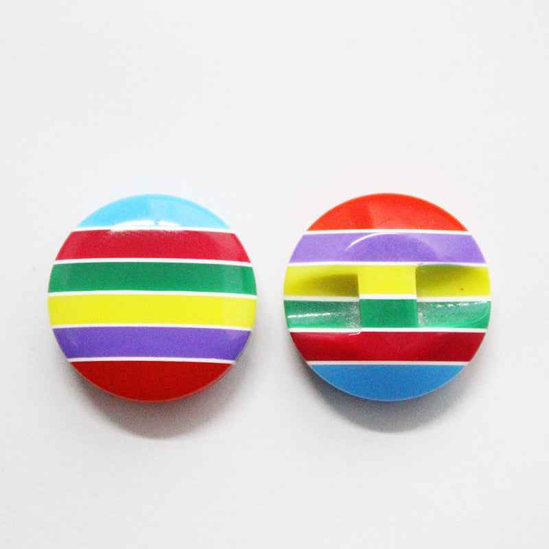 Colorful striped resin buttons in rainbow stripes with red, orange, yellow, green, and blue