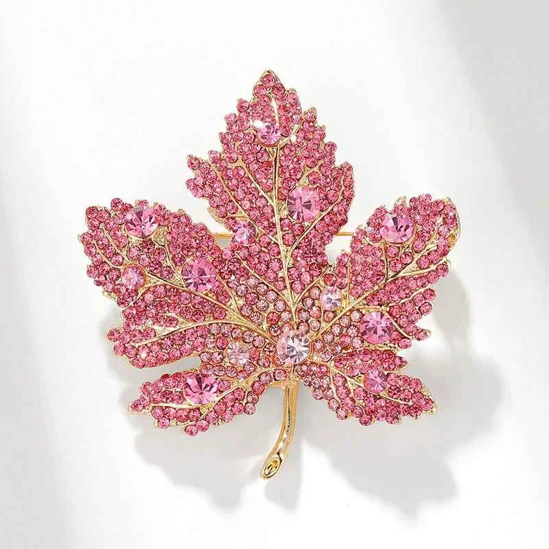 Rose pink maple leaf brooch pin with diamond-accent rhinestones and gold-toned pin