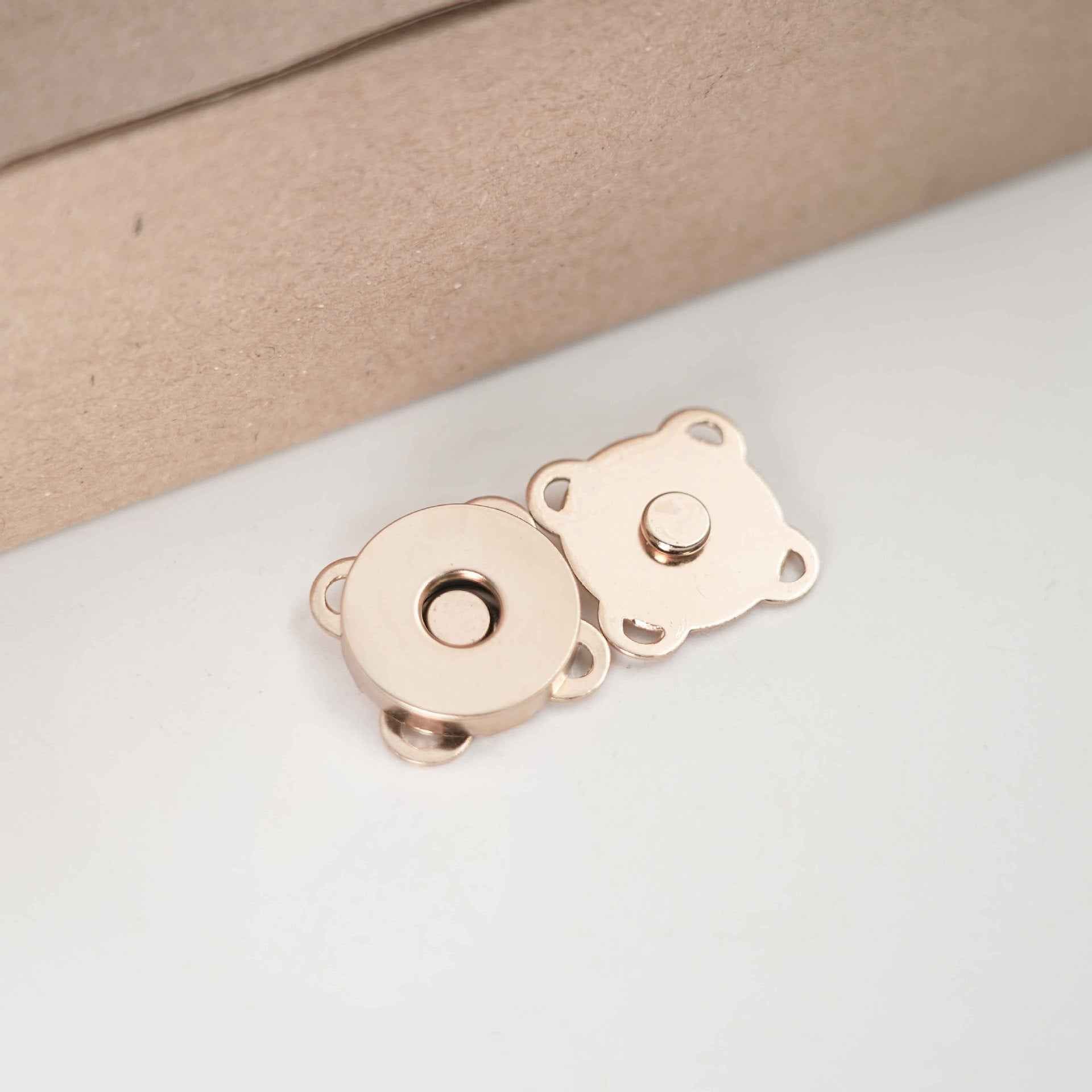 Flower-shaped metal magnetic snap buttons, gold-toned finish