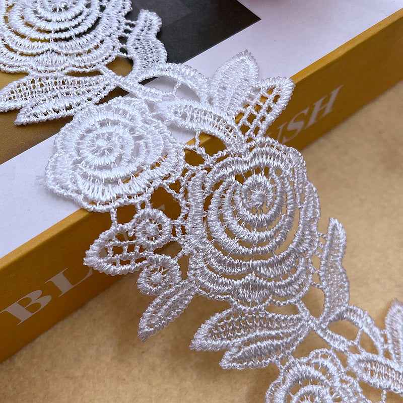 White rose floral lace trim with openwork loops and stitched outlines