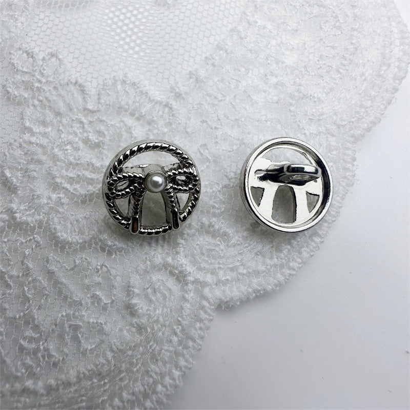 Silver French vintage hollow bow shirt button with faux pearl center, 11.5mm back view