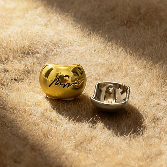 Gold arched monogram metal button with engraved letter and metal loop back