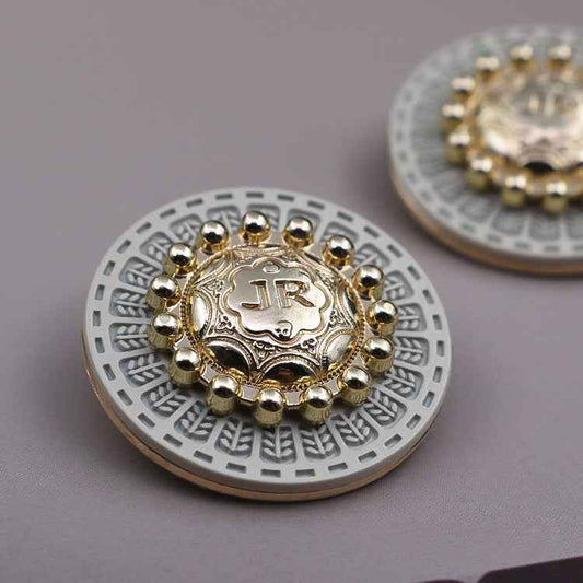 Round vintage metal shank button, gold center with white base and bead border