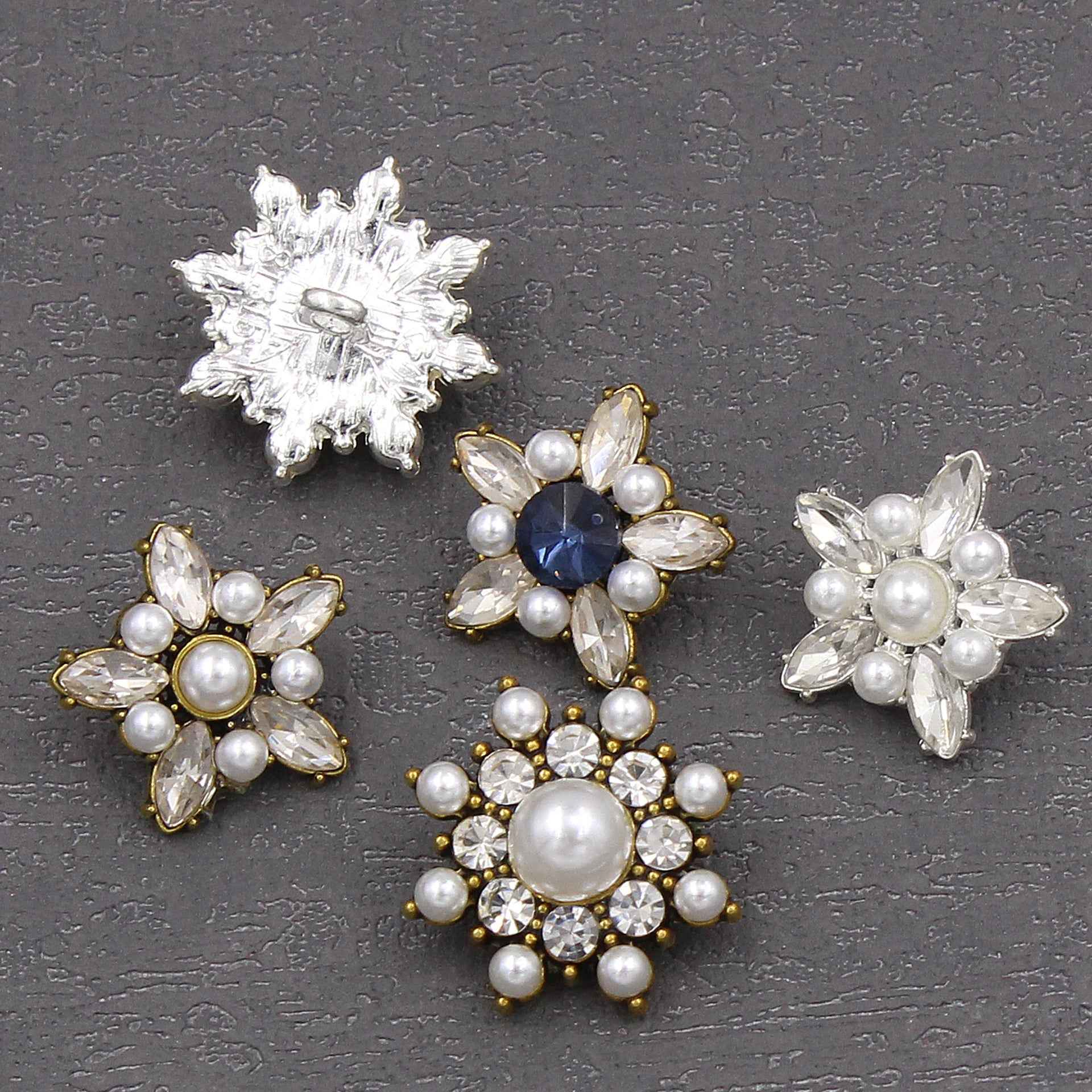 Star-shaped pearl crystal buttons, clear crystals and pearls on silver and gold-tone bases