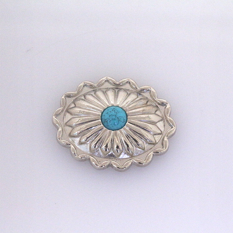 Turquoise metal stud button with scalloped rim and embossed floral center