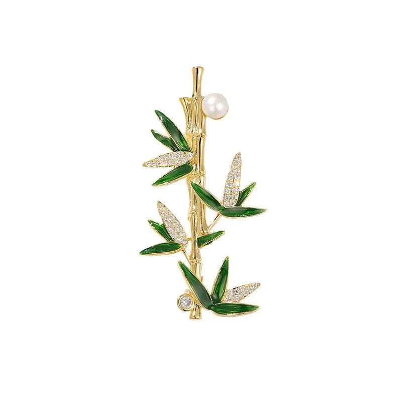 Gold bamboo pearl brooch pin with white pearl and green enamel leaves
