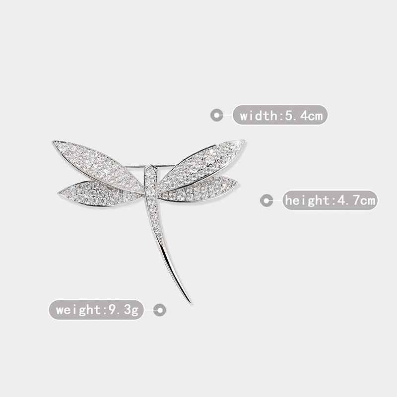 Dragonfly brooch, silver-tone zircon stones; 5.4 cm wide, 4.7 cm high