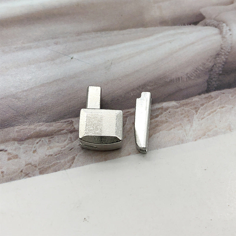 Silver-tone #5 zipper slider retainer set with metal insertion pin tab