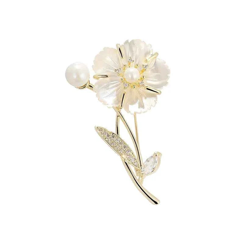 White pearl and camellia flower brooch pin, gold-tone stem with clear zircon accents