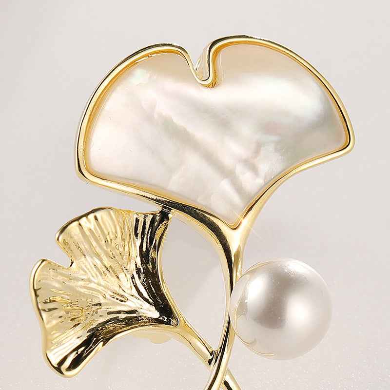 Ginkgo leaf brooch with mother-of-pearl shell and freshwater pearl, gold tone