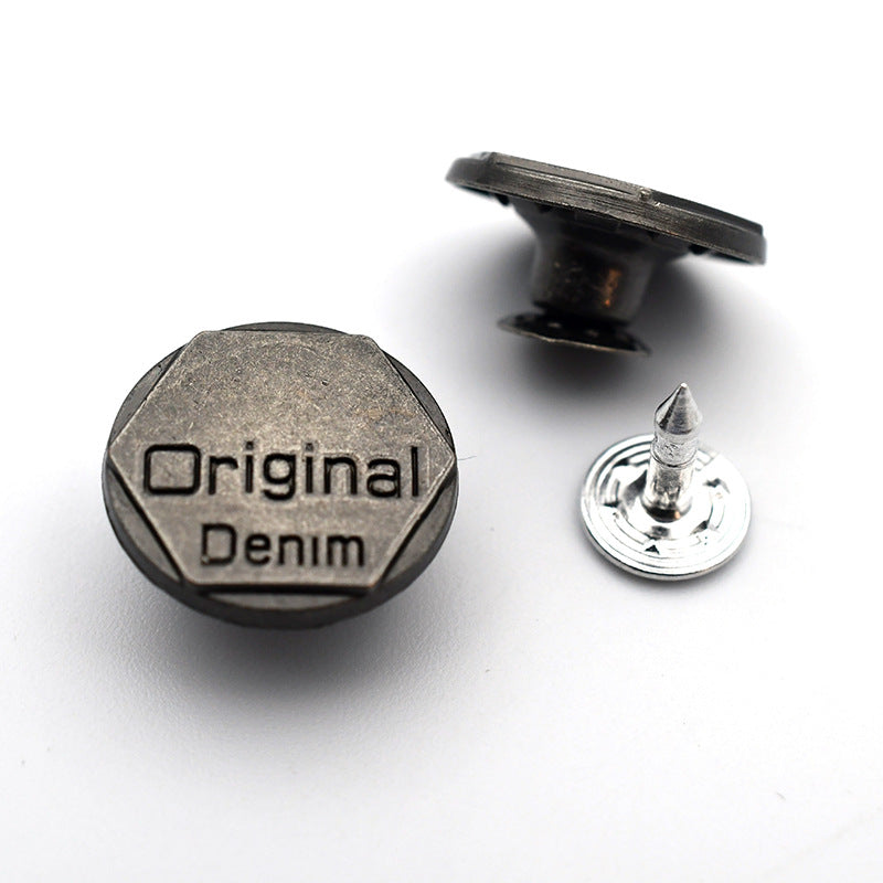 Round metal shank stud button with “Original Denim” text front and pointed post back