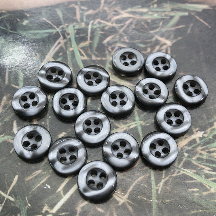 Round resin shirt buttons, 4-hole, metallic grey, front faces arranged
