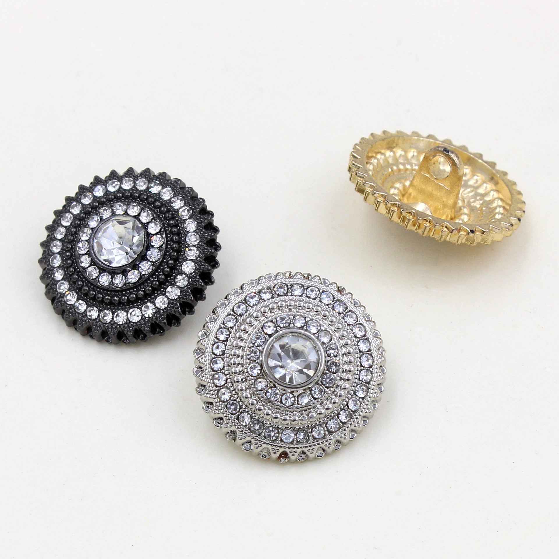 Rhinestone shank buttons: black and silver fronts, gold back with attachment prongs