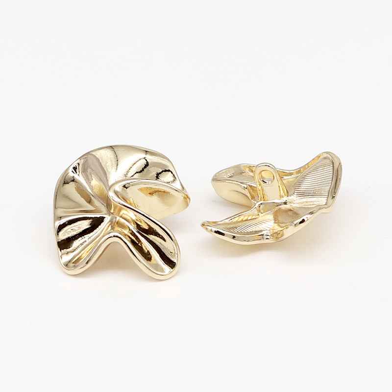 Light gold geometric floral metal shank buttons with embossed petal swirl design