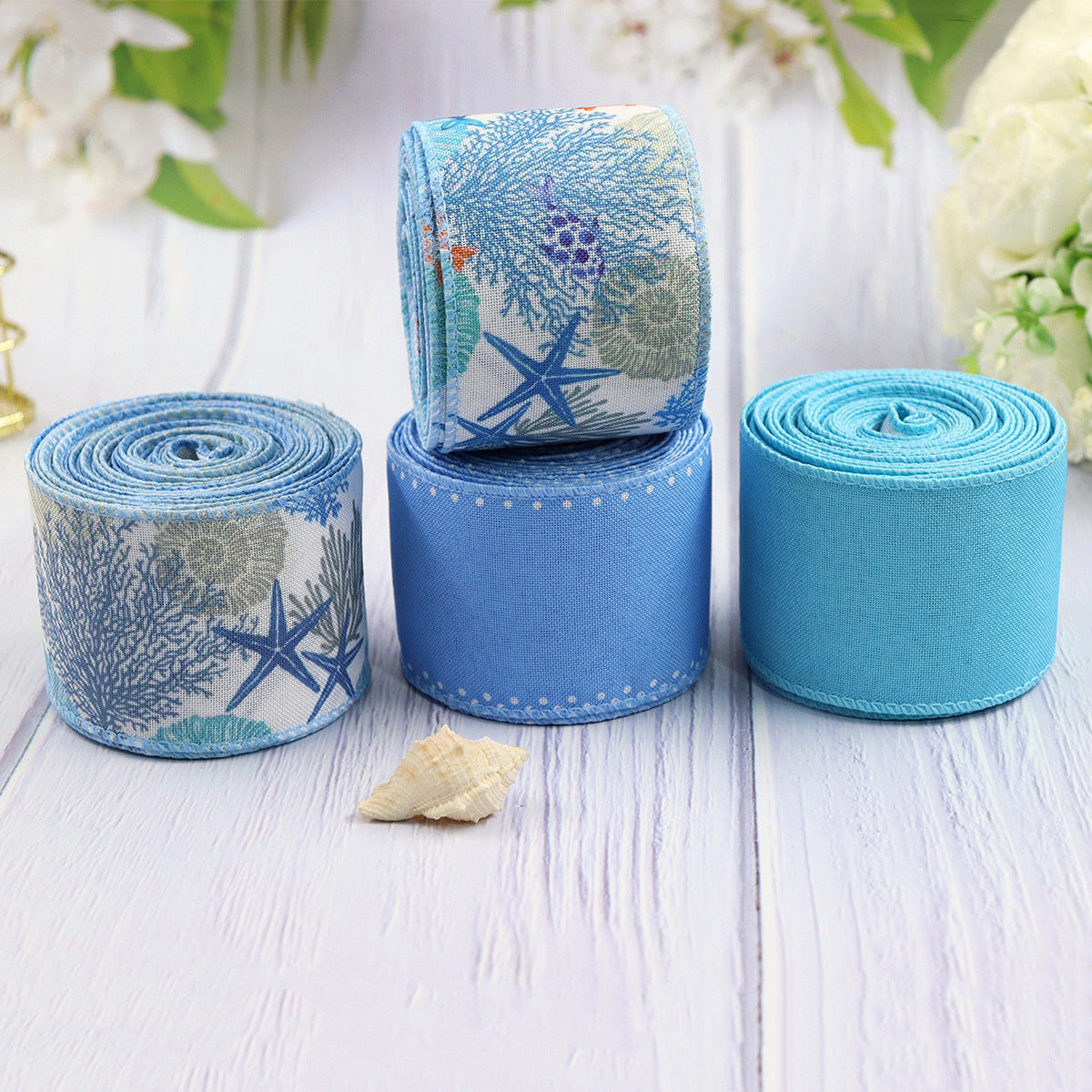 Blue coral reef grosgrain ribbon roll set in 4-pack, blue and patterned spools