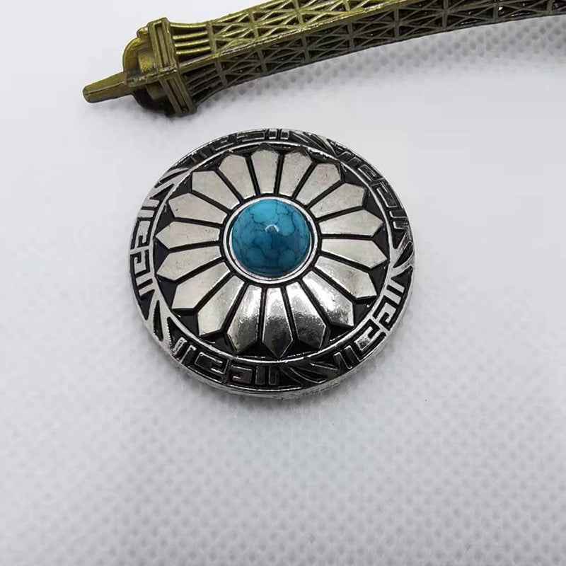 Turquoise cabochon round alloy button with black-and-silver carved chrysanthemum design
