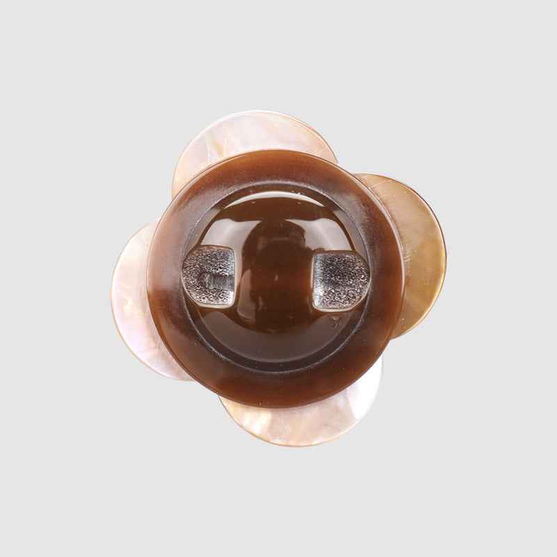 Coffee-brown butterfly shell button with smooth mother-of-pearl sheen