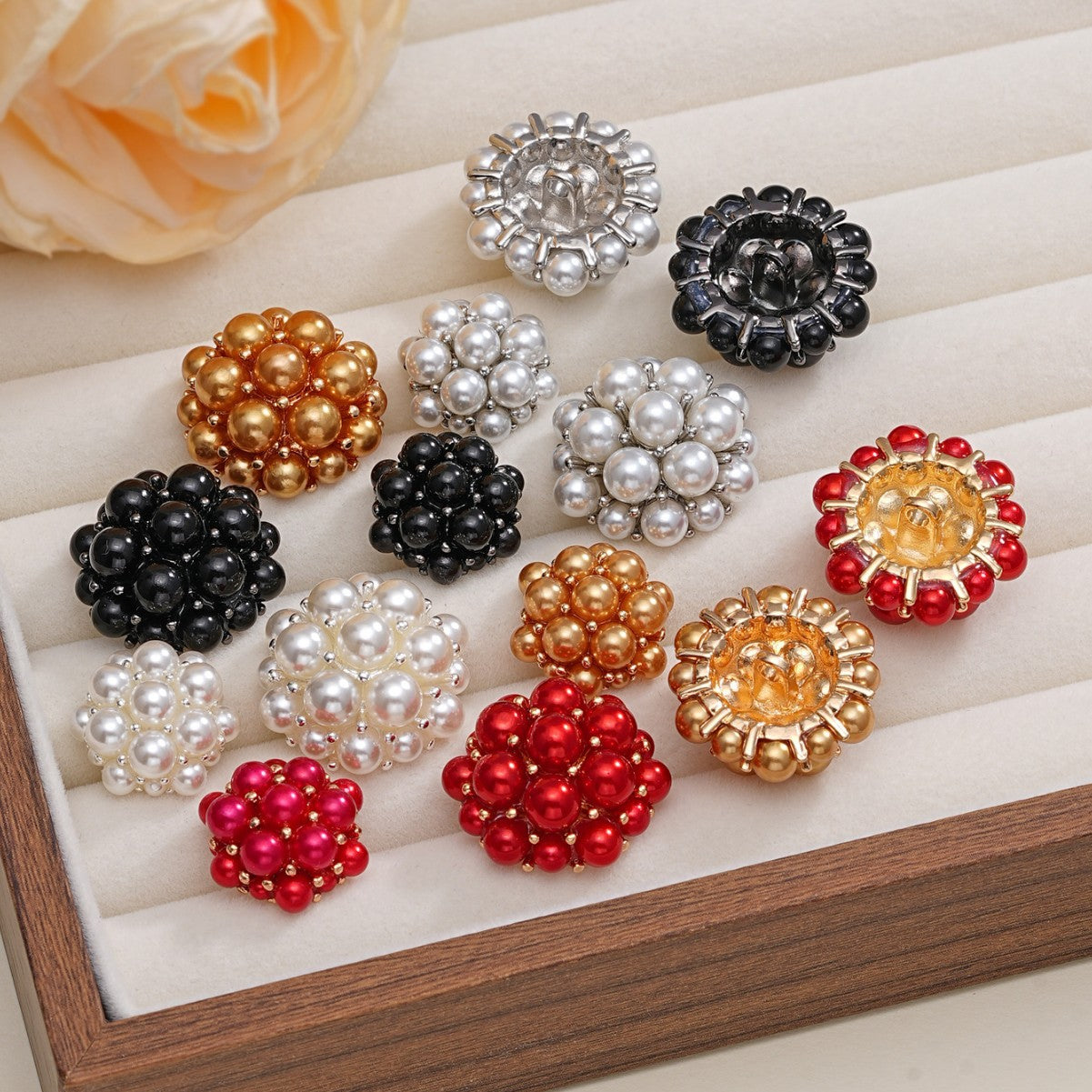 Assorted floral 3D pearl metal buttons with white, gold, black, and red beads