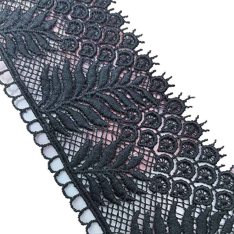 Black embroidered leaf lace trim with net background and fringed scalloped edge