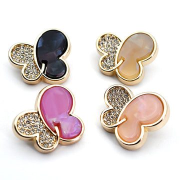 Butterfly rhinestone shank buttons: black, pink, and gold-tone settings