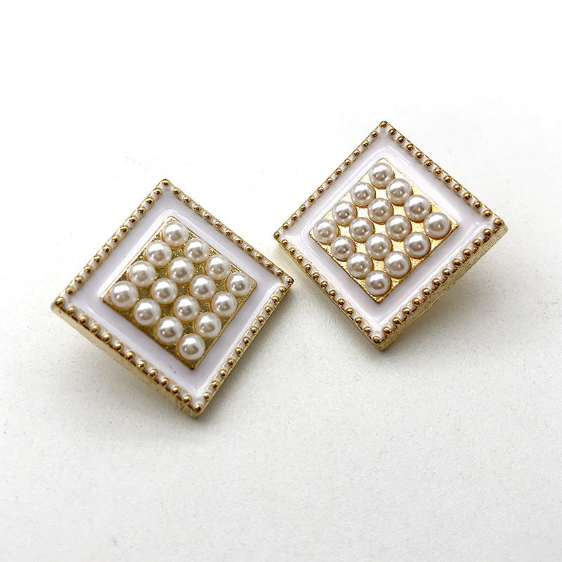Square pearl metal shank buttons: gold frame, white center, grid of round white pearls