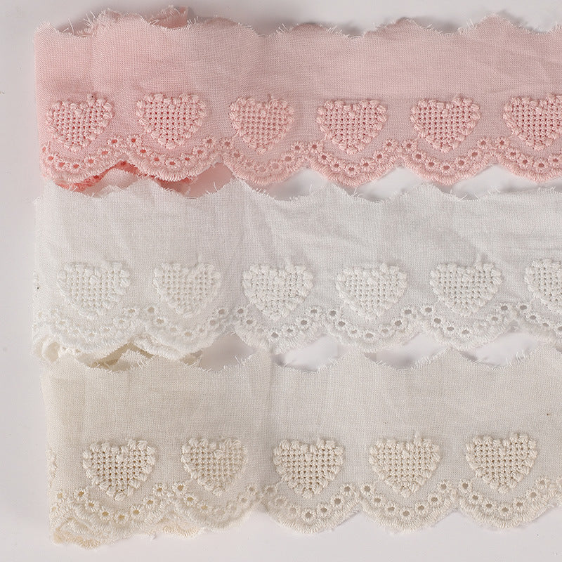 Blush pink and white cotton lace trim with hollow heart embroidery, scalloped rows