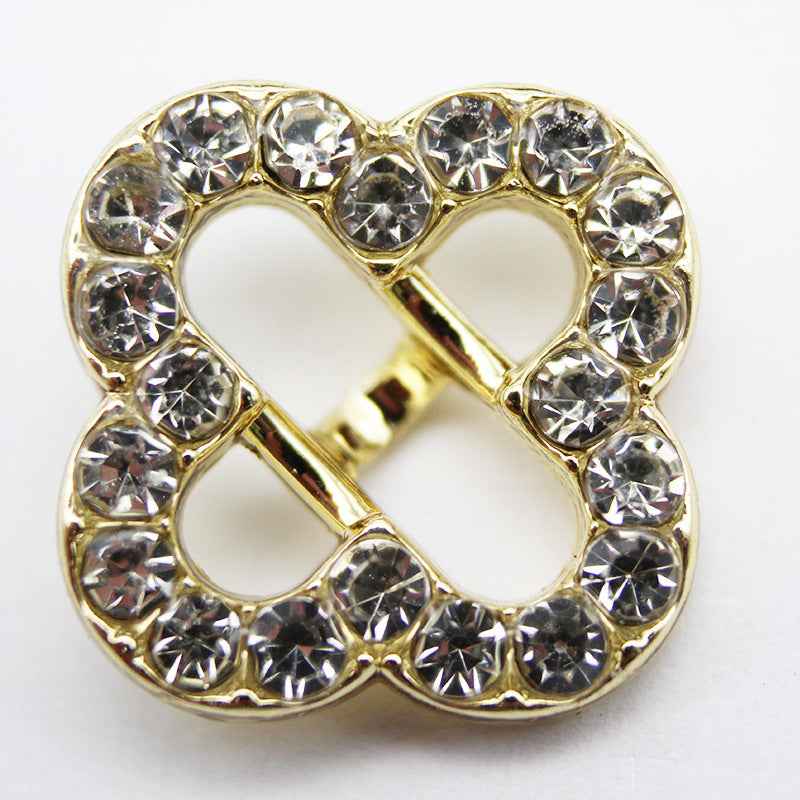 Gold-tone four-leaf clover rhinestone shank button with round crystal settings
