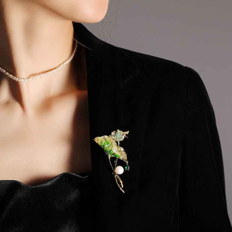 Lotus leaf brooch with white pearl and emerald-green drop stone, zircon details