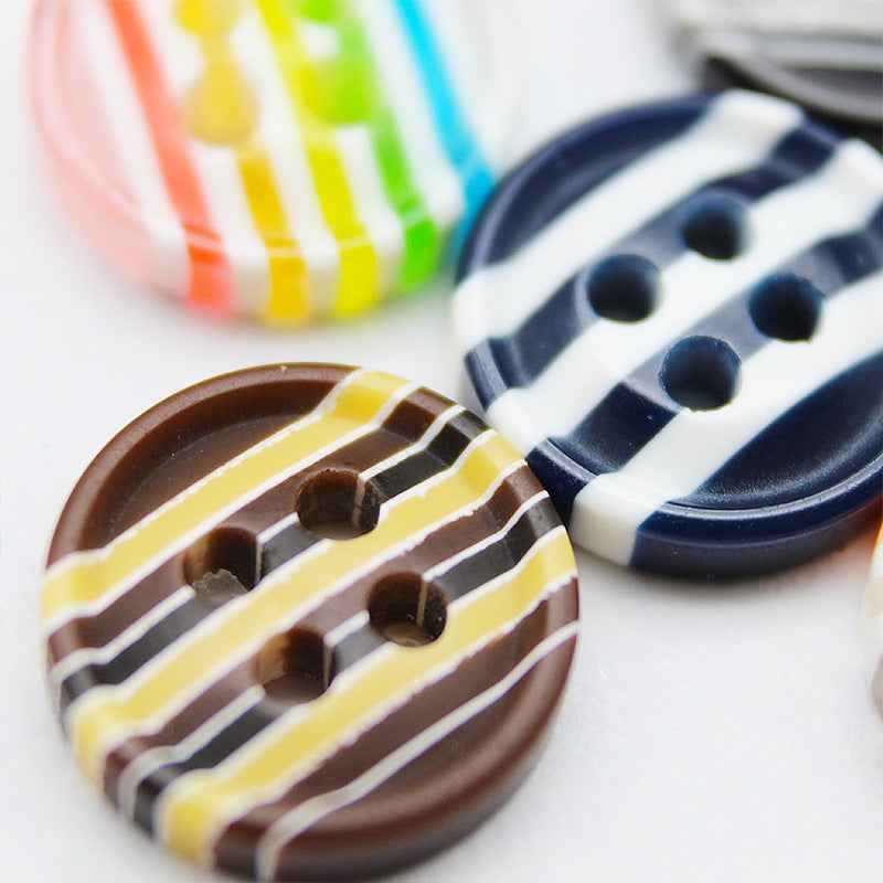 12mm resin buttons, brown with yellow stripes, 4-hole design, 2 shown