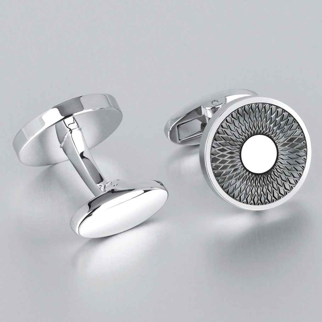 Silver-tone cufflinks, round face with textured pattern and central white circle