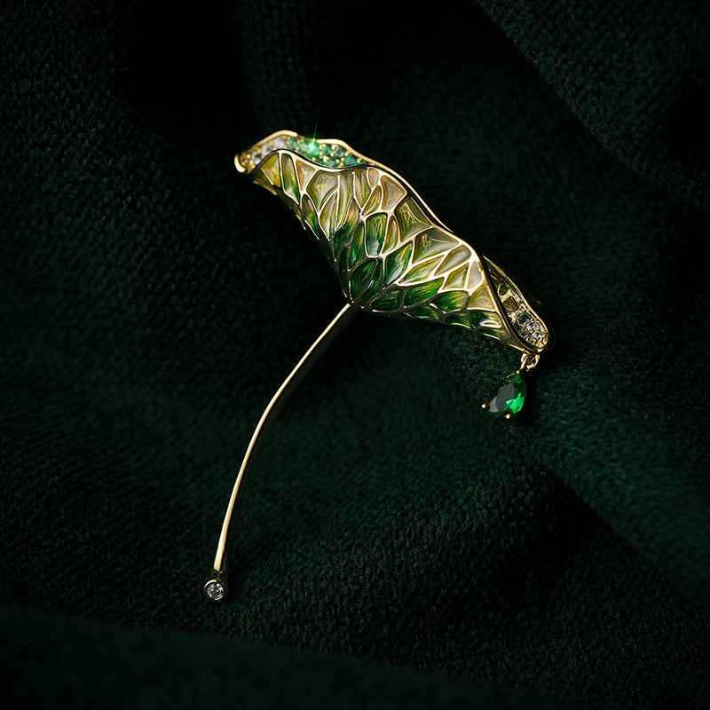 Green enamel lotus leaf brooch pin with clear zircon accents and waterdrop