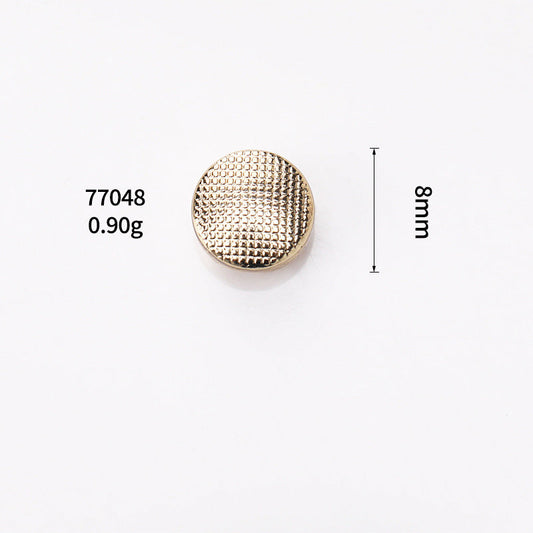 Gold round grid metal shank button, 8mm diameter, textured front