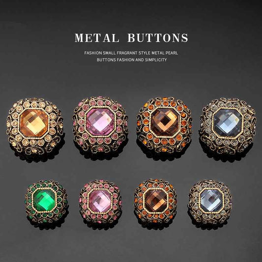 Rhinestone coat shank buttons, gold-tone settings with purple, orange, and blue-grey faceted centers