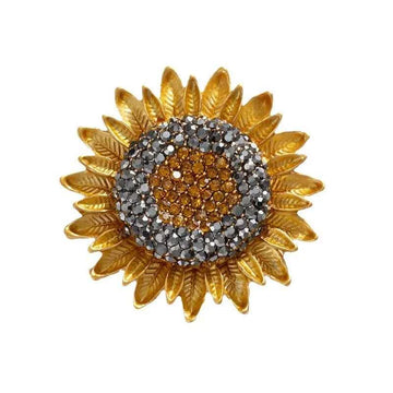 Vintage sunflower crystal brooch with gold leaf petals and dark gem center