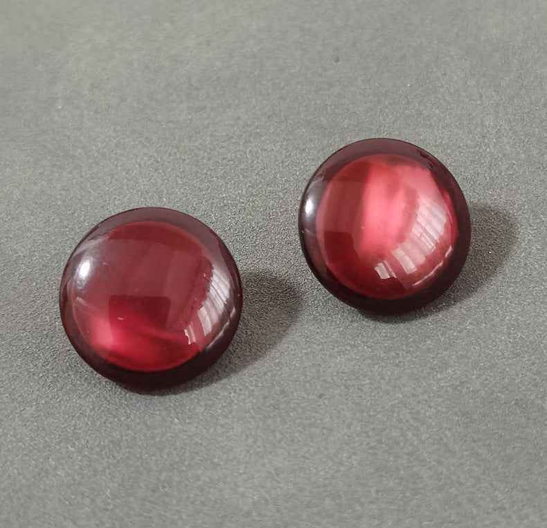 Domed resin shank buttons, deep red and maroon tones