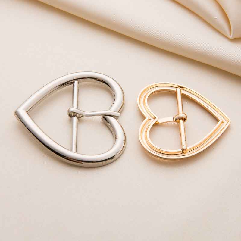 Heart-shaped roller buckles set: silver and gold metal hearts with bars