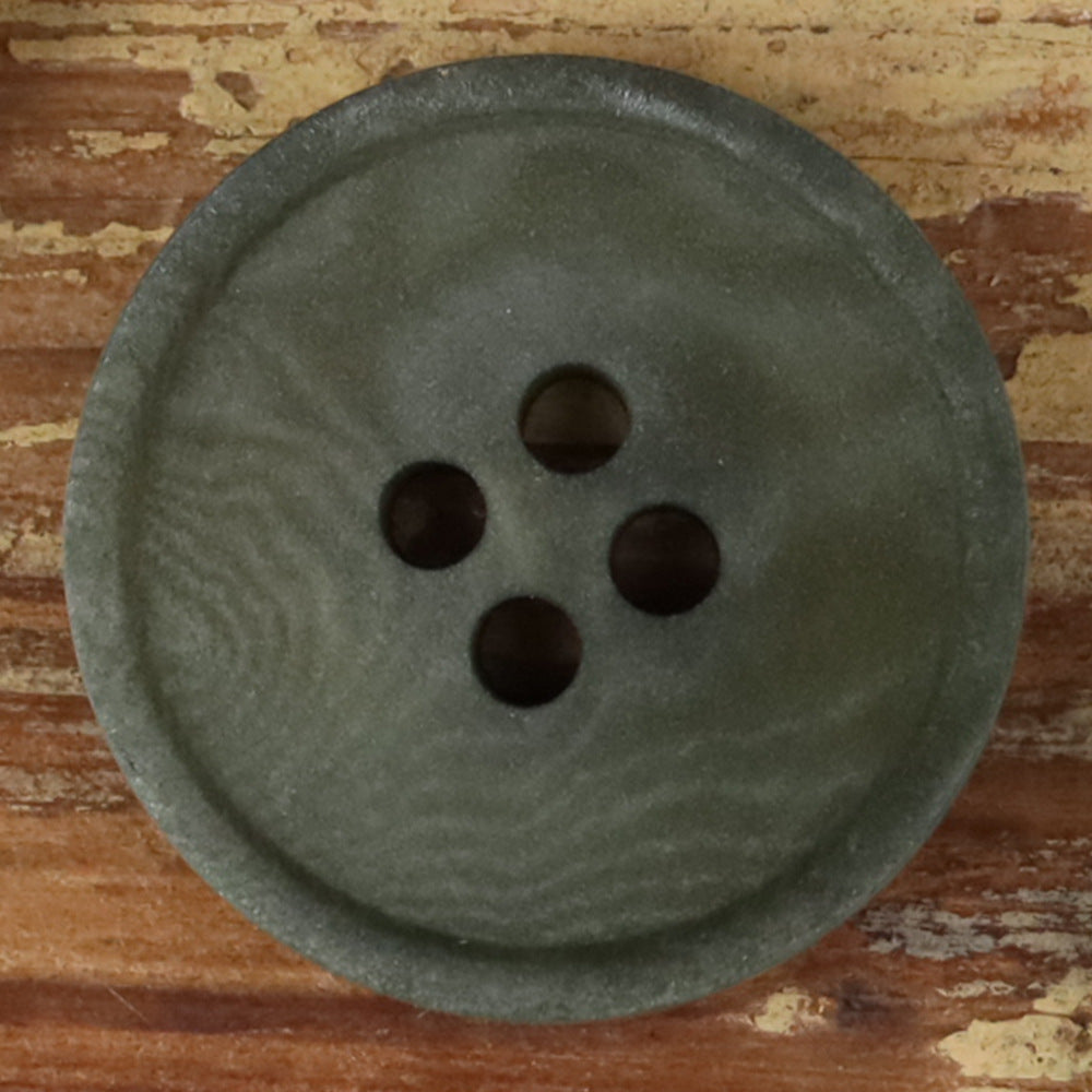Dark green round 4-hole matte natural nut button with four dark holes